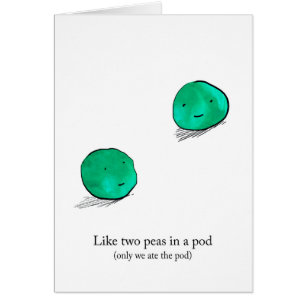 Duas ervilhas em um cartão do vagem