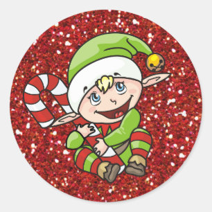 Duende do Natal com etiquetas do bastão de doces