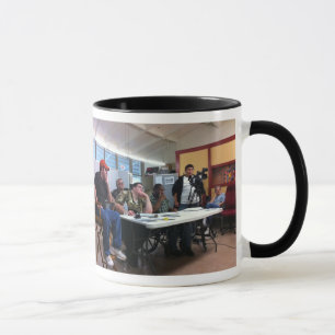 E+ Caneca da imagem das produções