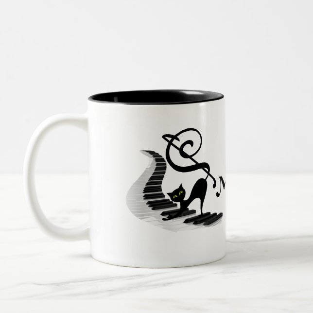 Em Dois Tons Gato no teclado Piano tocando caneca de café (Esquerda)