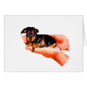 Em seu cartão das mãos (filhote de cachorro)