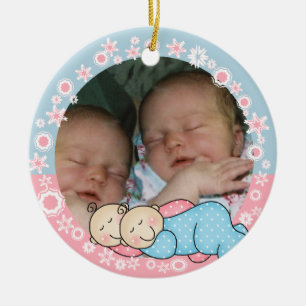 Enfeites de natal gêmeos do menino e da menina øs