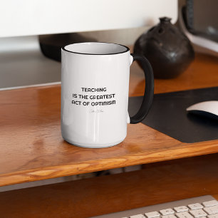 Ensine a caneca do professor de mudança