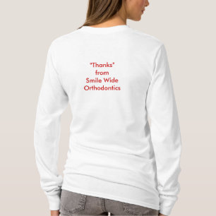 Estalado dentro para dizer o t-shirt dos obrigados