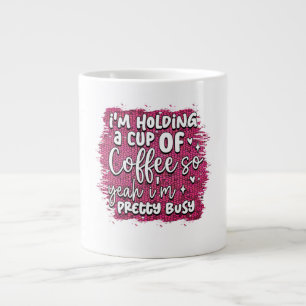 Estou segurando uma xícara de café, então