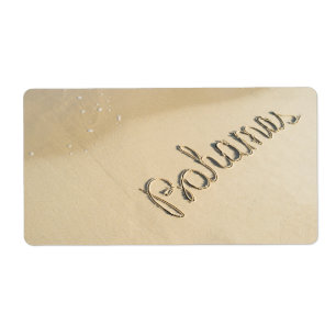 Etiqueta Bahamas esculpidas na areia da praia