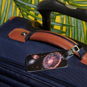 Etiqueta De Bagagem A Galáxia De Rodas De Cartaz E Suas Galáxias Compa