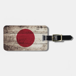Etiqueta De Bagagem Bandeira de Japão na grão de madeira velha