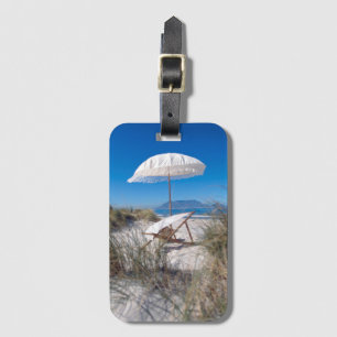 Etiqueta De Bagagem Guarda-chuva e cadeira na praia