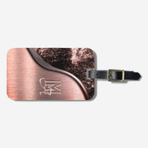 Monograma de metal rosa e pedra metálica