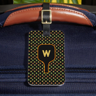 Etiqueta de bagagem (preta) e monograma de pílulas