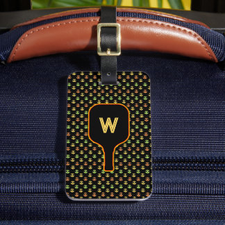 Etiqueta de bagagem (preta) e monograma de pílulas