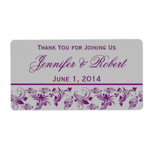 Etiqueta floral roxa e de prata da garrafa de águ