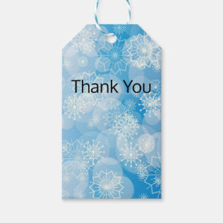 Etiqueta Para Presente Christmas snowflakes on a blue background       