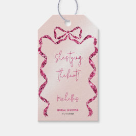 Etiqueta Para Presente Ela está dando o nó em um laço rosa brilhante e ch