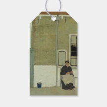 Mulher holandesa idosa em frente à sua casa