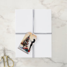 Silhueta feminina com árvore de Natal decorada