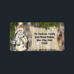 Etiqueta Smiling Snowman Christmas<br><div class="desc">Etiquetas de Natal adoráveis apresentam um sorridente boneco de neve com um chapéu de Papai Noel com fundo de madeira.</div>
