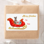 Etiqueta Staffordshire Terrier Christmas Sleigh Gift<br><div class="desc">Nesses adesivos de etiqueta de presente de Natal bonito, um porco americano Staffordshire Terrier fica sentado em um bonito trenó decorativo de ouro e vermelho. Ao lado do cão, os pacotes de presentes são amarrados com arcos coloridos. O texto dourado à direita diz "MERRY CHRISTMAS" e o texto personalizado está...</div>