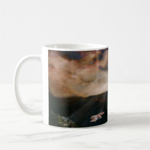 falcão Vermelho-atado sobre a caneca de café dos