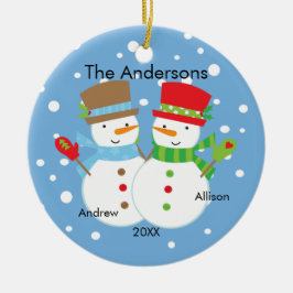 Família bonito do boneco de neve dos enfeites de