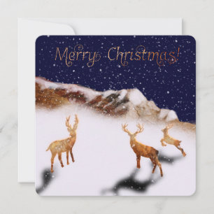 Feliz Natal - cervos de madeira e montanhas na nev