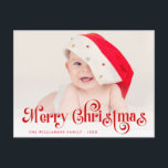 Feliz Natal com letra estilosa em cartão postal de<br><div class="desc">Um design vermelho festivo com foto de bebê fofo e letras vermelhas sobrepostas. O texto e a mensagem podem ser personalizados.</div>