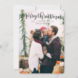 Feliz Natal e um cartão do feliz ano novo