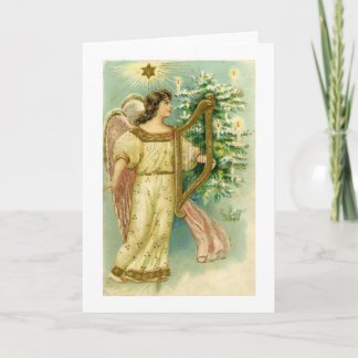 Festividades Anjo com a harpa no cartão da árvore de Natal