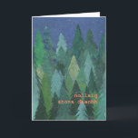 Festividades Cartão de Natal nevado da floresta: Gaélico<br><div class="desc">Um cartão de Natal chique com uma floresta de árvores de Natal na neve, de um design de papel pintado à mão da colagem por Judy Adamson. O cumprimento na parte dianteira, rotulação alaranjada/cor-de-rosa, é Feliz Natal no gaélico irlandês e você pode personalizar a mensagem interna. (Apenas um clique do...</div>