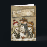 Festividades Cartão primitivo do Natal do boneco de neve<br><div class="desc">O cartão primitivo do Natal com um boneco de neve que reliaxing no céu nocturno com a neve lasca-se caindo.</div>