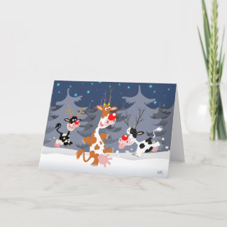 Festividades Reindeer no cartão de saudação da neve