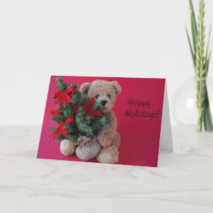 Festividades ursinho de peluche com cartão de saudação da árvor