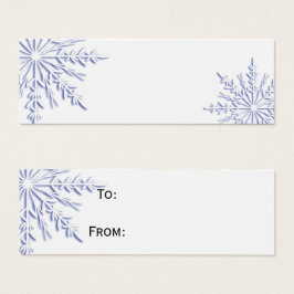 Flocos de neve azuis em marcas de presentes branca