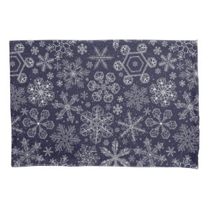 Flocos de neve brancos em azul