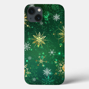 Flocos de neve do Ouro Xmas em segundo plano