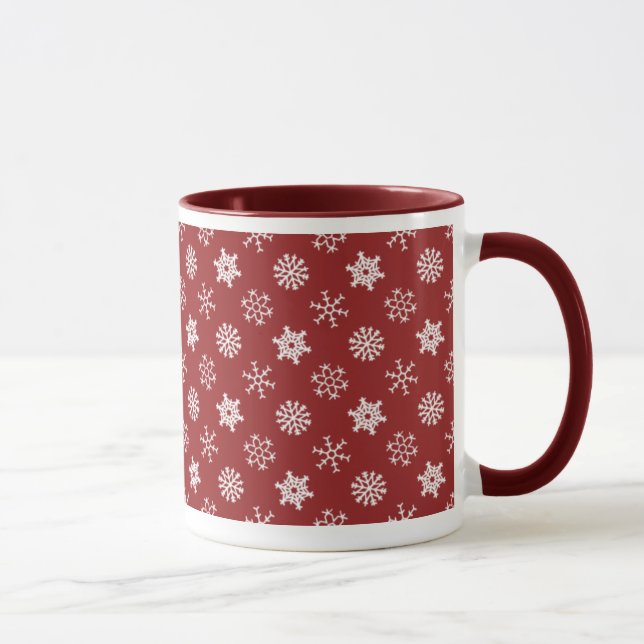 Flocos de neve na caneca vermelha do feriado (Direita)