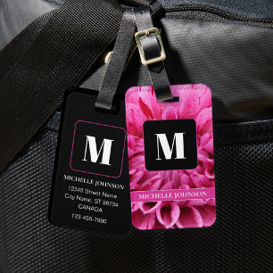 Flor rosa com etiqueta de bagagem monográfica