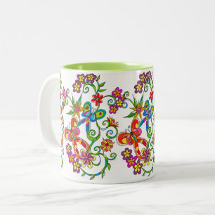 Flores e caneca da borboleta por Leslie Clair