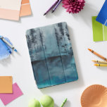 Florestas de inverno<br><div class="desc">Winter Woods I de Chariklia Zarris. Apresenta árvores escuras em tons azuis profundos num estilo semelhante a aquarela.</div>