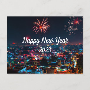 Fogos de artifício do feliz ano novo no cartão pos