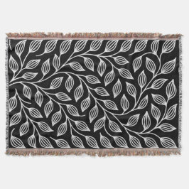 Folhas brancas e pretas jogam cobertor