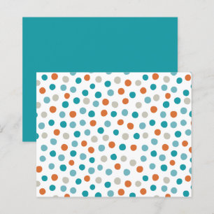 Folhas de bolinhas, de cor azul e laranja
