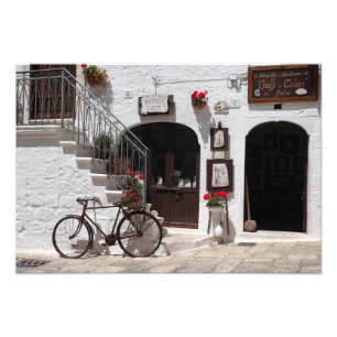 Foto Bicicleta e montra velhas em Apulia