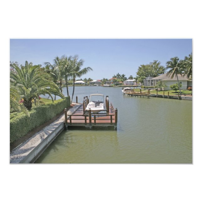 Foto Casas e docas no canal Marco Island Flórida (Frente)