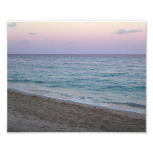 Foto cor-de-rosa calma cénico da praia do por do