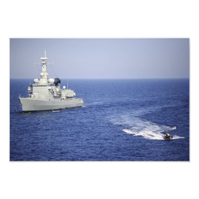 Foto Equipe de marinho portuguesa num barco insuflável (Frente)