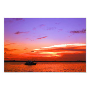 Foto iate e por do sol