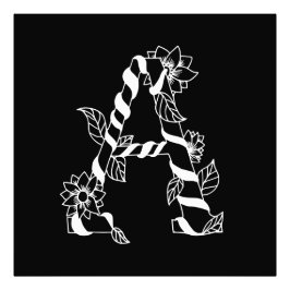 Foto Letra negra e branca "A" com flores geminadas