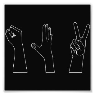 Foto Mãos de papel das tesouras da rocha